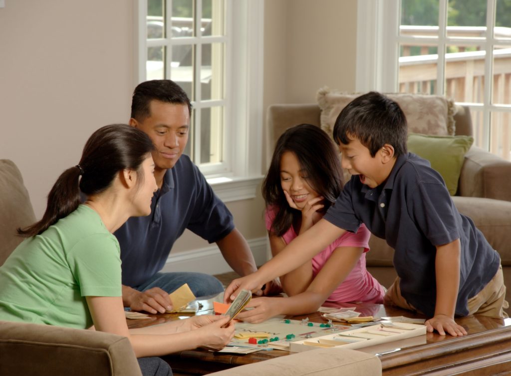 Asian Chinese Family Playing